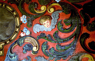 Ángeles y guirnaldas; Decoración pictórica del arco formero del sotocoro
